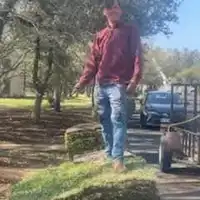 Cooper's Landscaping team installing sod